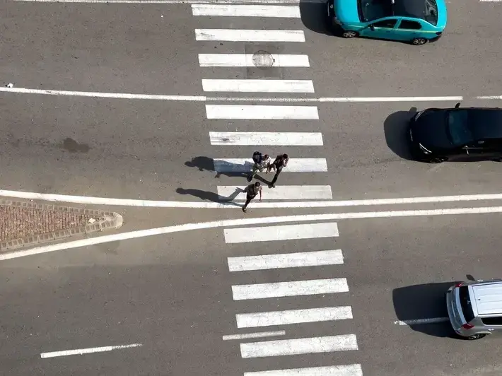 Avondale pedestrian fatality insurance negotiation involving delivery driver, commercial policy, and desert summer crash evidence